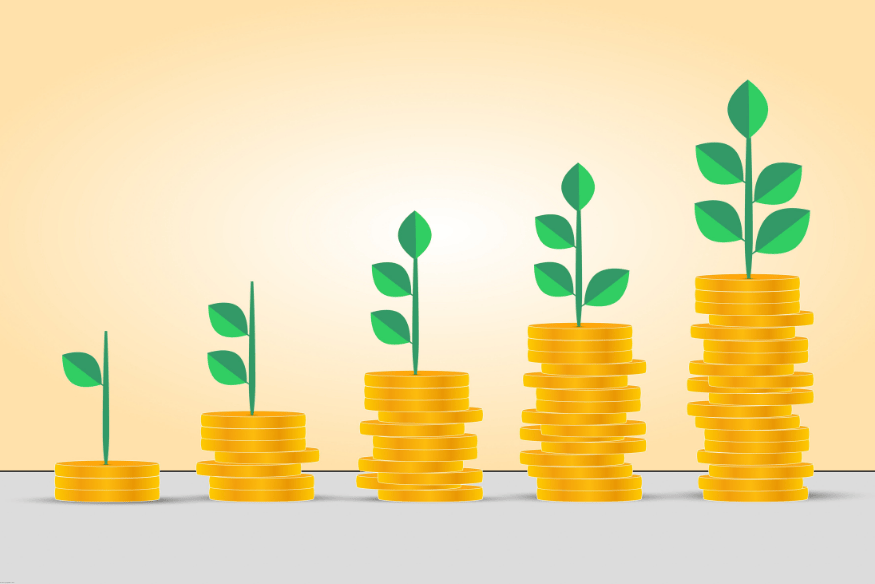 Growing stacks of coins with green plants symbolizing investment growth