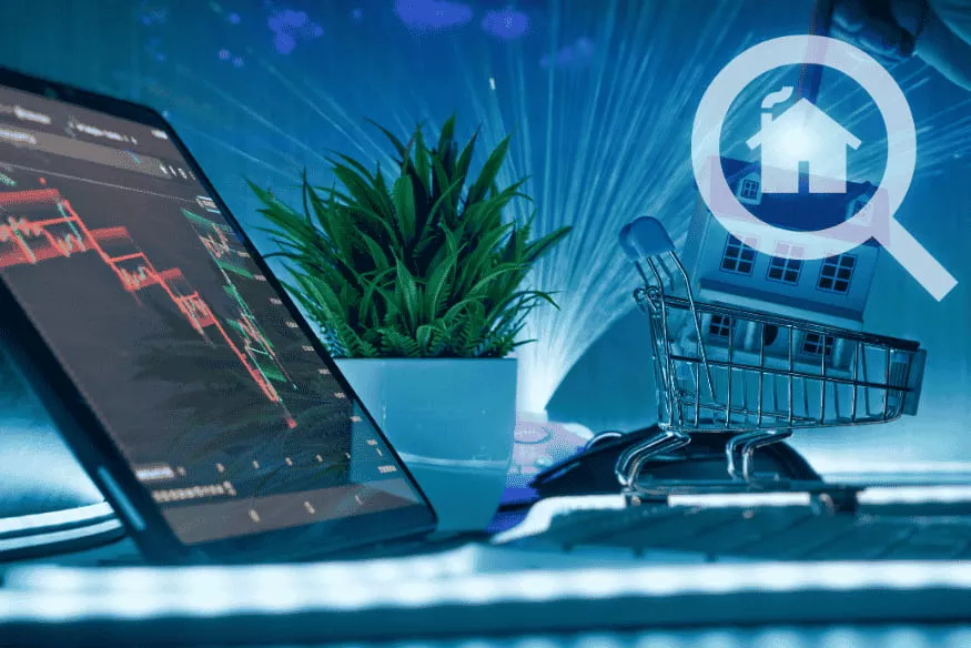 Digital investment concept with stock chart and house model in shopping cart