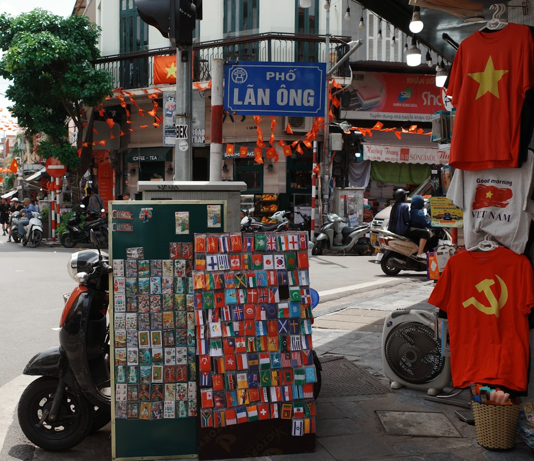 Street stall with vietnamese flags and t-shirts